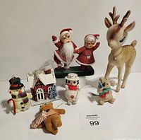 Full lot including dancing Santa and Mrs Claus, two snowmen figures, plush bear and dog, modern putz house, and large flocked reindeer.