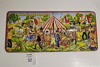 Front view of large rectangular vintage tin paint tray with colorful illustration of children dancing and playing instruments around a maypole.
