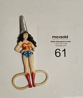 Front view of Wonder Woman scissors showing full figure and scissor blades.