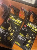 Six new pistol grip adjustable spray head handles for aerosol spray cans in packaging, with three brass-colored interchangeable nozzles each.
