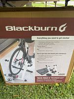 Photo of the Blackburn Tech Mag 5 Trainer Kit box showing product features and images of the bike trainer setup.