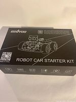 Front view of factory sealed Osoyoo Robot Car Starter Kit black box with product name and illustration