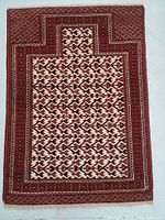 Full view of the hand knotted Balouch prayer rug showing intricate patterns and colors.