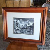 Overall photo of the framed Ansel Adams reproduction print showing the wood frame and matting