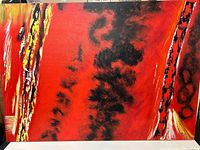 Full view of the painting propped against wall