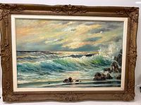 Full view of framed seascape painting showing overall composition and frame condition