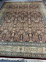 Full view of carpet showing overall pattern and fringe