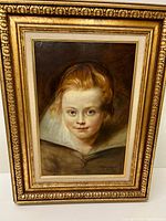 Front view of framed oil painting portrait of a girl