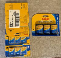 Front view of unopen box packs of Kodak Advantix 400 APS film, showing 3-roll packs and overall packaging design.