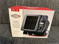 Unopened box of RoadPro ceramic heater/fan with product image showing 12V direct wire, heat or fan function, tip-off switch, and 900W power.