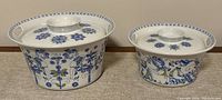 Photo of the large and medium covered serving bowls side by side showing pattern and sizes