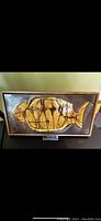 Framed 1960s studio pottery enamel fish wall plaque showing full piece and texture