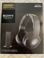Front view of unopened Sony wireless RF headphones box showing headphones and transmitter image with branding and features.