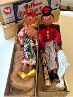 Pair of Pelham Puppets Mitzi and Fritzi in original boxes showing full puppets and packaging.