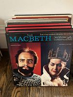 Stack of vinyl albums showing Verdi Macbeth album on top with two portraits in costume on cover.