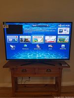 Front view powered on showing Smart Hub interface