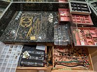 Overhead view of all assorted jewelry and storage pieces on countertop