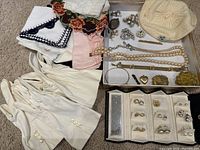 Overall assortment of gloves, handkerchiefs, jewelry and earrings