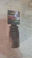 Front view of 1-1/4 inch GearWrench deep drive impact socket with packaging label showing size and drive.