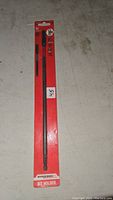 Front view of Milwaukee 12 inch impact magnetic bit holder in unopened red and black packaging.