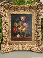 Front view of painting and ornate gold frame