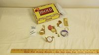 Seven assorted pocket watches laid out with a ruler and yellow IBOLD box in background, all untested condition.