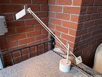 Full side view of the retro vintage adjustable desk lamp with visible lamp shade and base