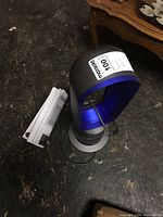 Dyson Hot+Cool AM05 bladeless fan heater angled view showing loop amplifier and base