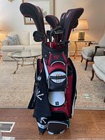 Full view of Bomb bag loaded with clubs and headcovers