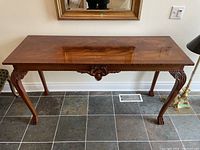 Full front view of hall table showing top, apron and leg placement