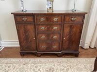 Front view of sideboard with drawers and doors closed
