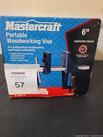 Photo of original packaging box of a Mastercraft 6 inch portable woodworking vise showing product details and brand name.