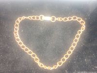 Copper bracelet chain laid flat showing full length and clasp.