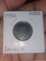 Front side of the 1950 Danish 2 Ore coin showing the crowned monogram and year.
