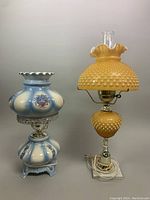 Full view of both lamps side-by-side showing overall shape, color and size comparison.