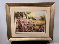 Framed print showing full view of the artwork with detailed gold frame and beige matting.