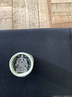 Photo of the coin roll end showing the denomination '50 CENTS' and year '2015' with a crest design.