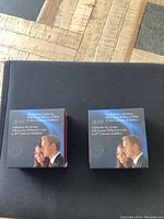 Two original boxes with image of Prince William and Kate Middleton on lid showing 2011 Royal Wedding celebration text.