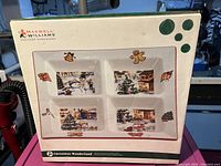 Photo of the Maxwell Williams ceramic Christmas platter in original box showing Christmas Wonderland branding and festive illustrations.