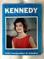Front cover of the 1964 magazine showing Jacqueline Kennedy in a red dress and pearls with the title 'KENNEDY The Bravest Woman In The World'.
