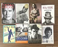 Front covers of the eight biography and autobiography books showing titles and subjects