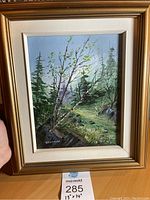 Full framed painting showing landscape scene with trees and rocks, signed Bernard.