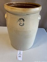 Front view of the crock showing number 8 painted mark and overall exterior.