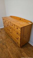 Front and left side view of pine dresser showing overall shape and drawer arrangement