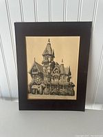 Full view of the signed pencil drawing showing the entire architecture of Carson Mansion, cream paper with detailed pencil ink and black mount board framing.