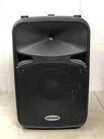 Front view of black Samson Auro D12 speaker cabinet showing front grille with Samson logo and horn-loaded tweeter.