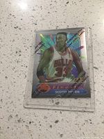Front of Scottie Pippen basketball card showing holographic image and Bulls jersey