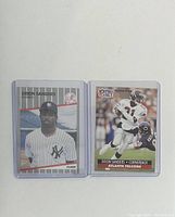 Front photo showing two Deion Sanders trading cards; one in baseball uniform and one in football uniform.