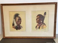 Full framed artwork showing two Native American portraits in one frame.