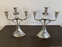 Frontal view of both candle holders side by side
